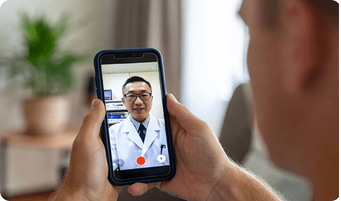 Patient speaking with a doctor by video before travelling